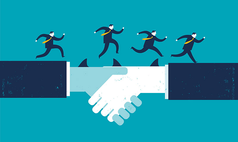 Image: Business men jumping over giant shaking hands. Useful Links: Human Resources Director.