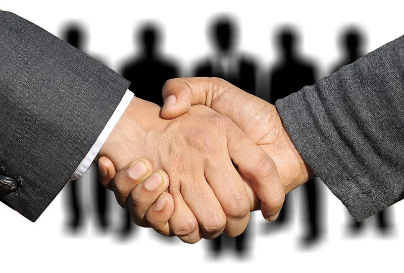 Image: Business People Shaking Hands.